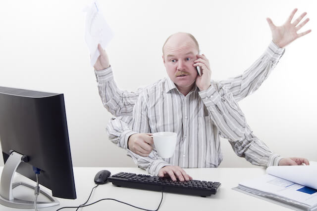 Overworked and Busy Businessman